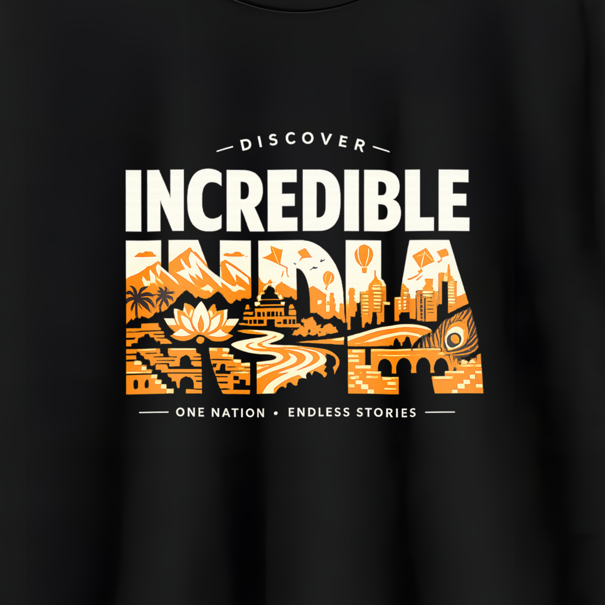 A black short-sleeve crewneck t-shirt hanging on a wooden hanger against a light gray wall. The shirt features a graphic print on the front with the text 'DISCOVERS INCREDIBLE ARIZONA' in white and orange over a scenic desert landscape illustration.