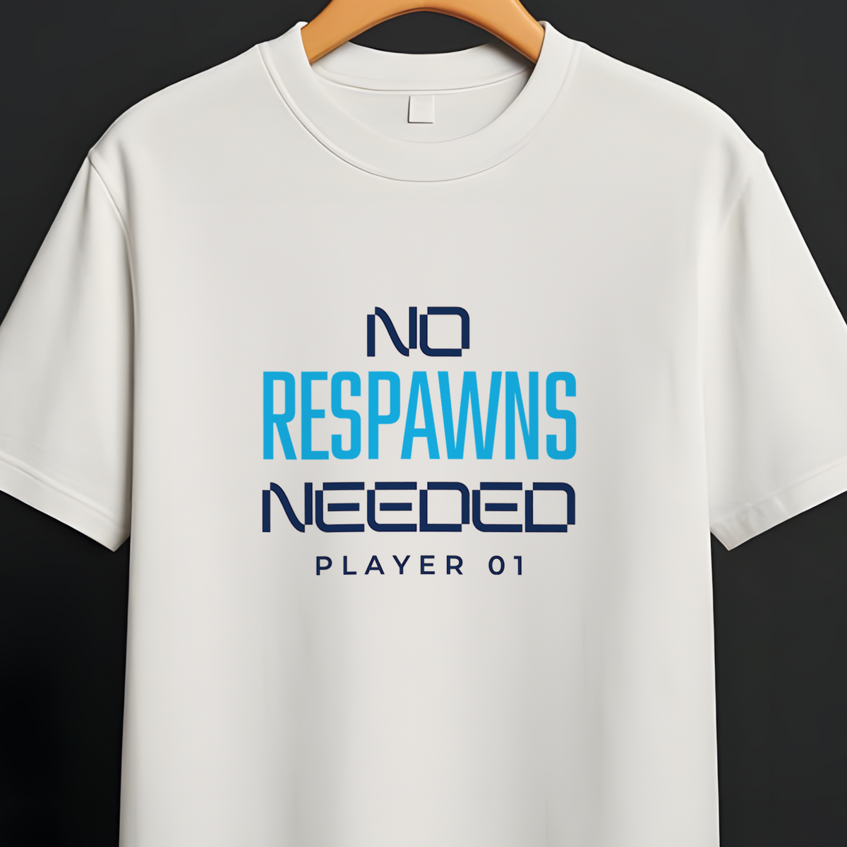 A white short-sleeve crewneck t-shirt hanging on a wooden hanger from a black clothing rack. The shirt features a graphic text print on the chest reading 'NO RESPAWNS NEEDED PLAYER 01' in blue and dark navy lettering.