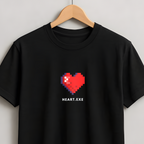 A black short-sleeve crewneck t-shirt hanging on a wooden hanger against a light gray wall. The shirt features a red pixelated heart graphic on the chest with the text 'HEART.