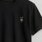 Black t-shirt on a wooden hanger against a light gray background