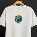 A white short-sleeve crewneck t-shirt hanging on a wooden hanger from a black clothing rack against a dark gray background. The shirt features a central graphic of a 3D optical illusion cube in blue and yellow, with small black text underneath.