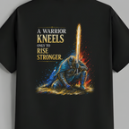 A black short-sleeve t-shirt hanging on a wooden hanger against a solid gray background. The back of the shirt features a large graphic print of a knight in blue armor kneeling with a glowing sword, accompanied by the text 'A WARRIOR KNEELS ONLY TO RISE STRONGER.